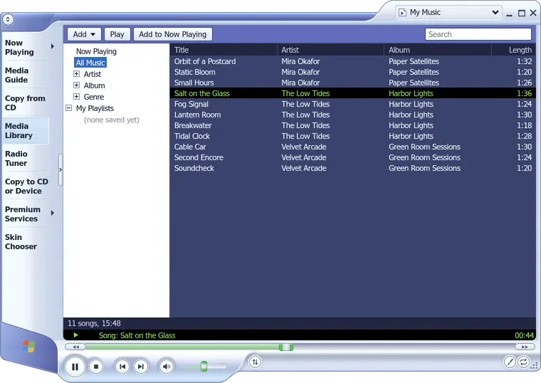 the media library in the classic skin: light blue frame, a tree of all music, artist, album and genre on the left, and a table of eleven songs with their artists, albums and lengths