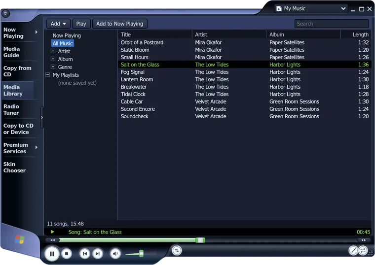 the same media library in the dark skin: the frame and the lists in dark grey and navy, the playing song still in green