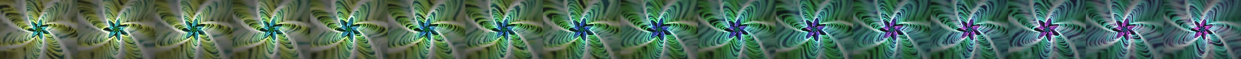 kaleidovision: a five-pointed flower of glowing lines that turns and changes colour, from yellow to green